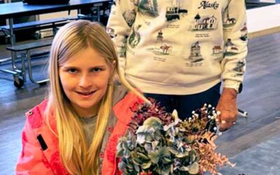Curtis 4-H Civic Club use hands for larger service